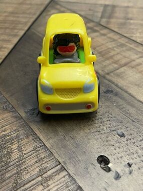 Fisher-Price Little People Wheelies yellow race car-built in driver